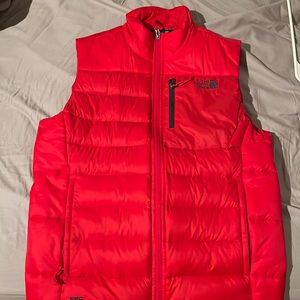 The North Face red vest. Great condition small